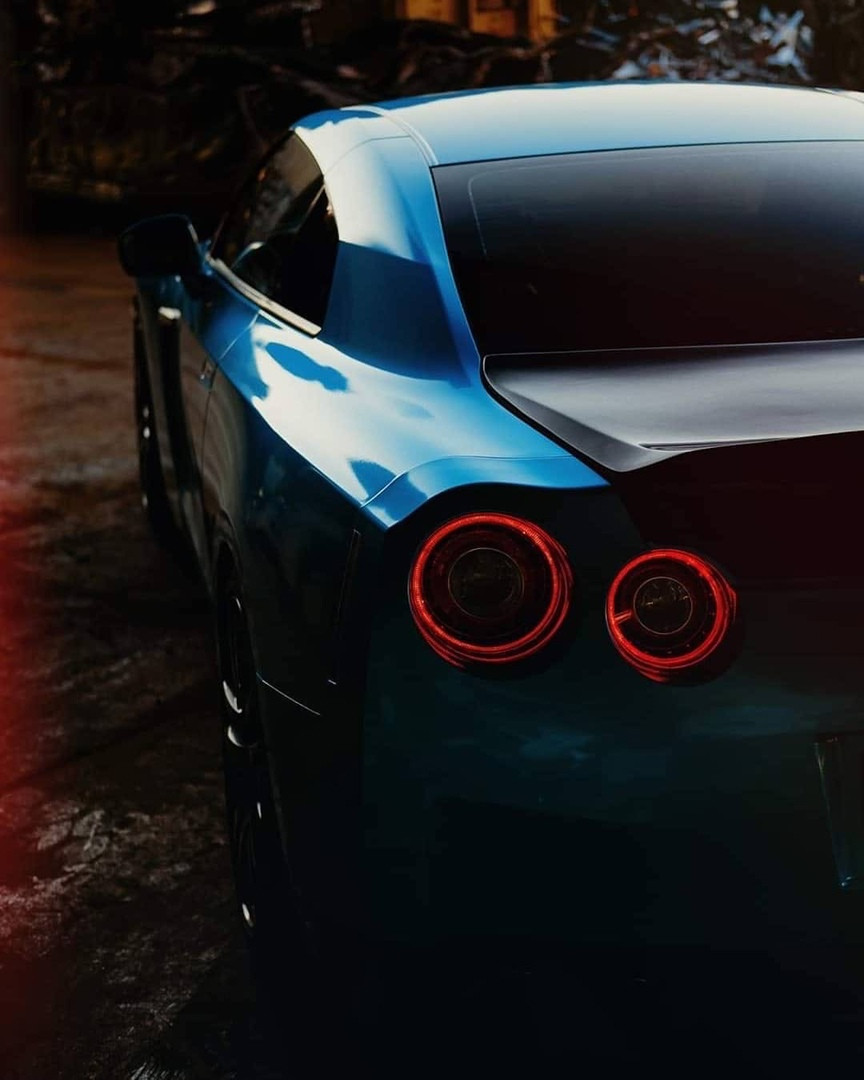 Оклейка пленкой Nissan цвет candy metallic RB16 Sea Turquoise