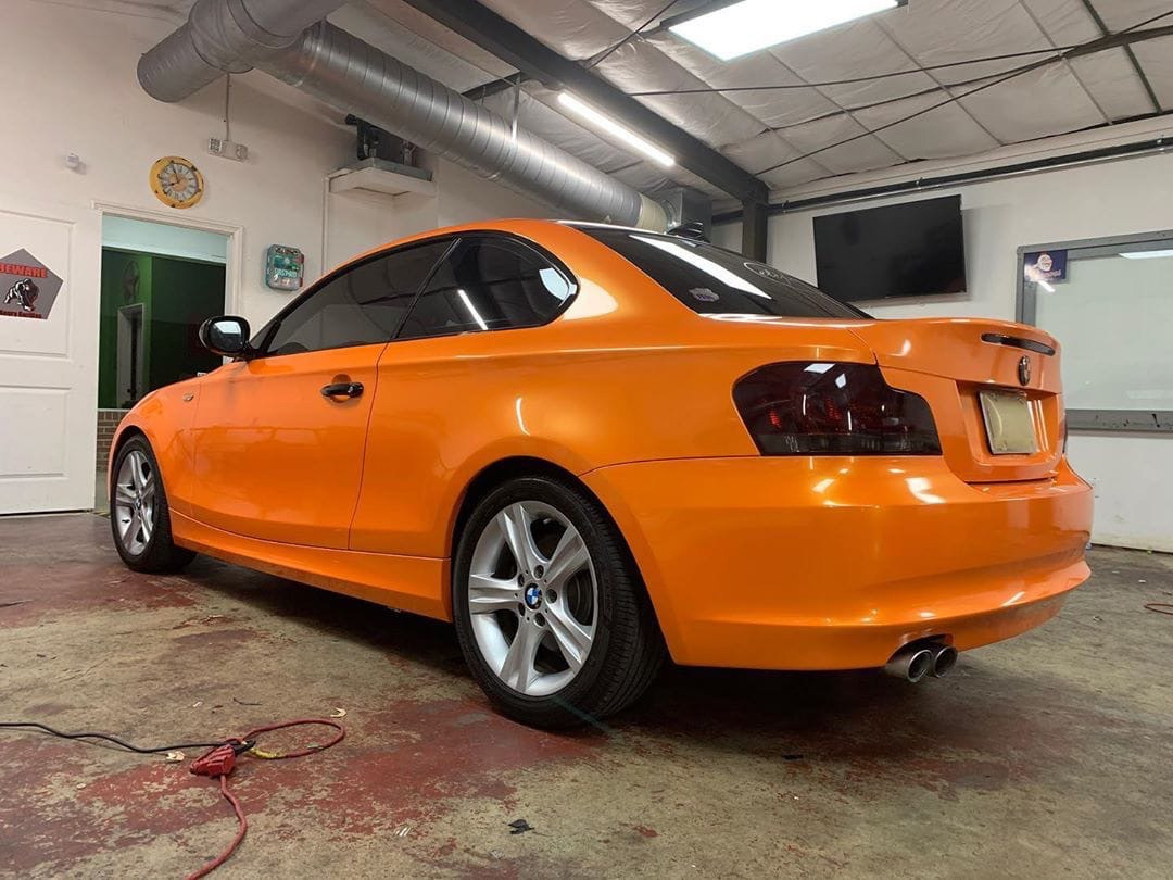 Оклейка пленкой BMW цвет candy metallic RB19 Deep orange